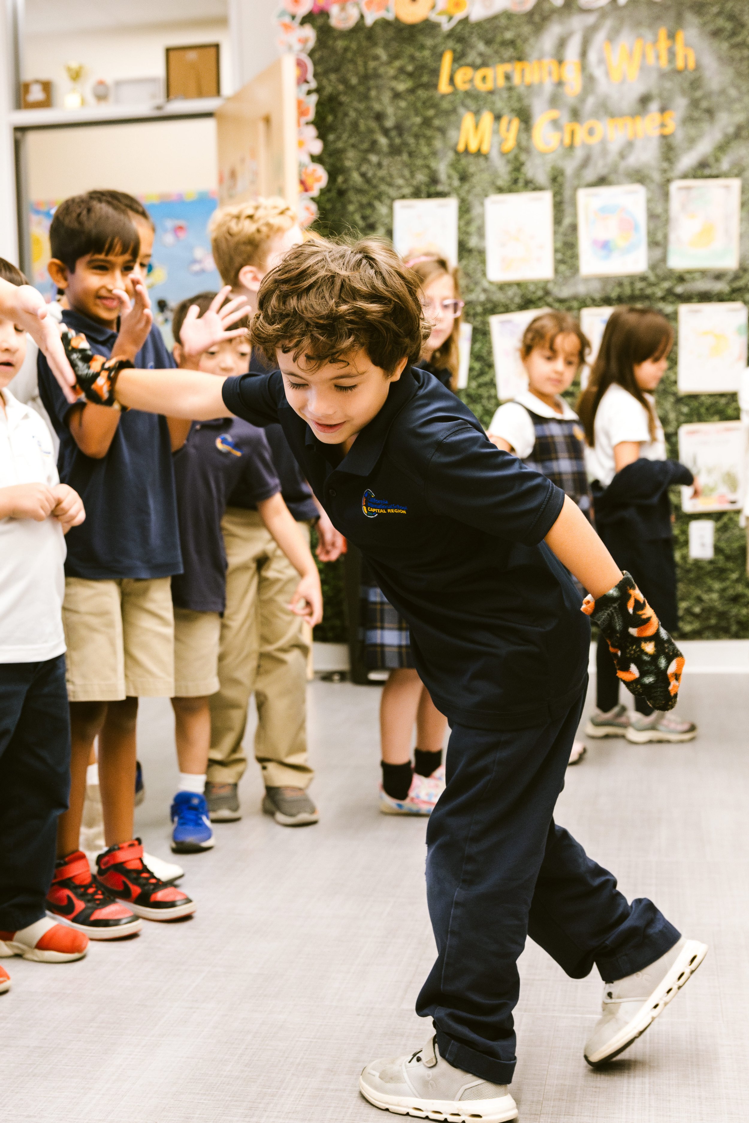 Student running and playing actively during outdoor physical education class